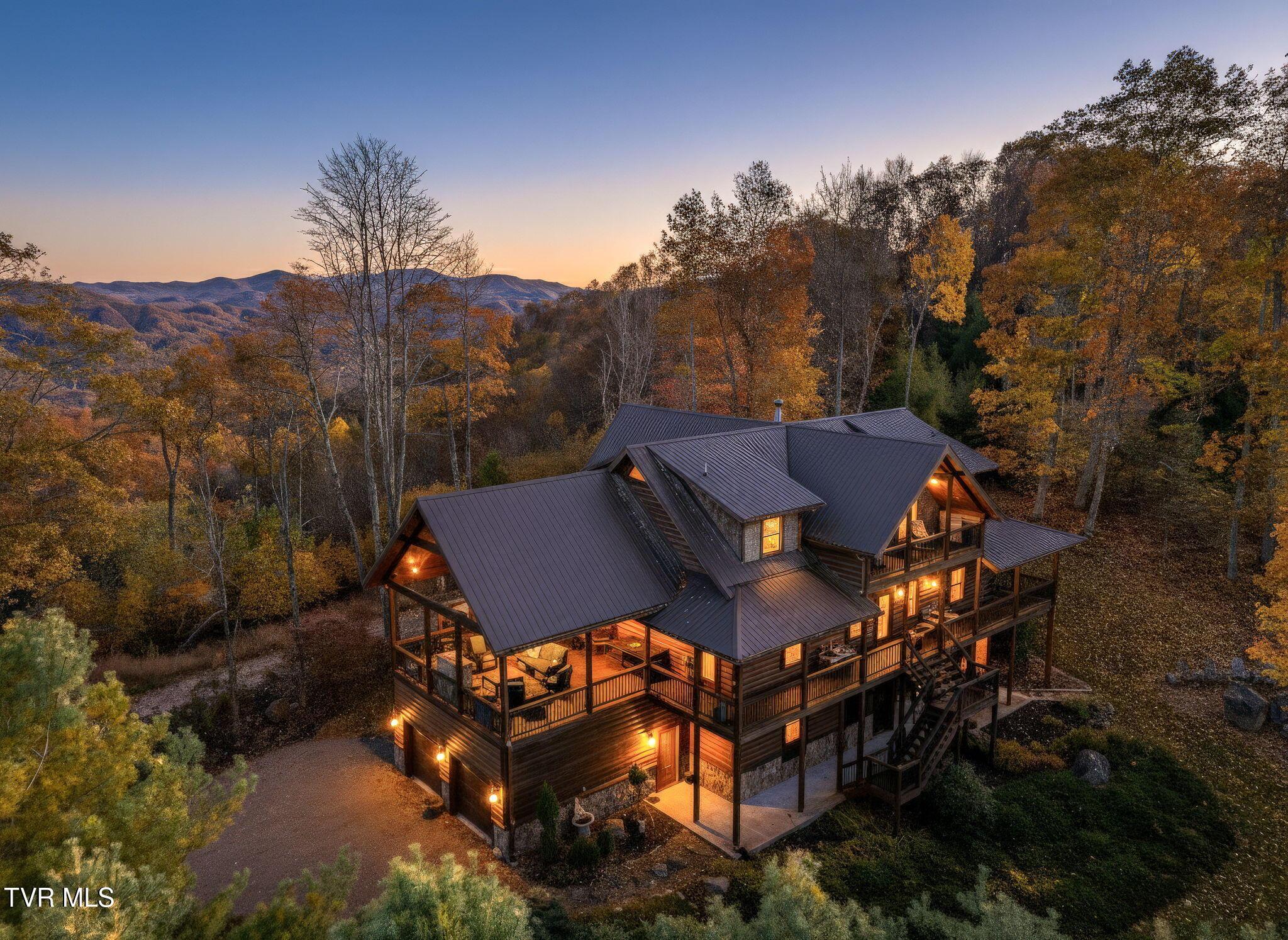 Photo of 4 bed, 5 bath, 5,001 sq ft single family residence at 7464 Callalantee Drive