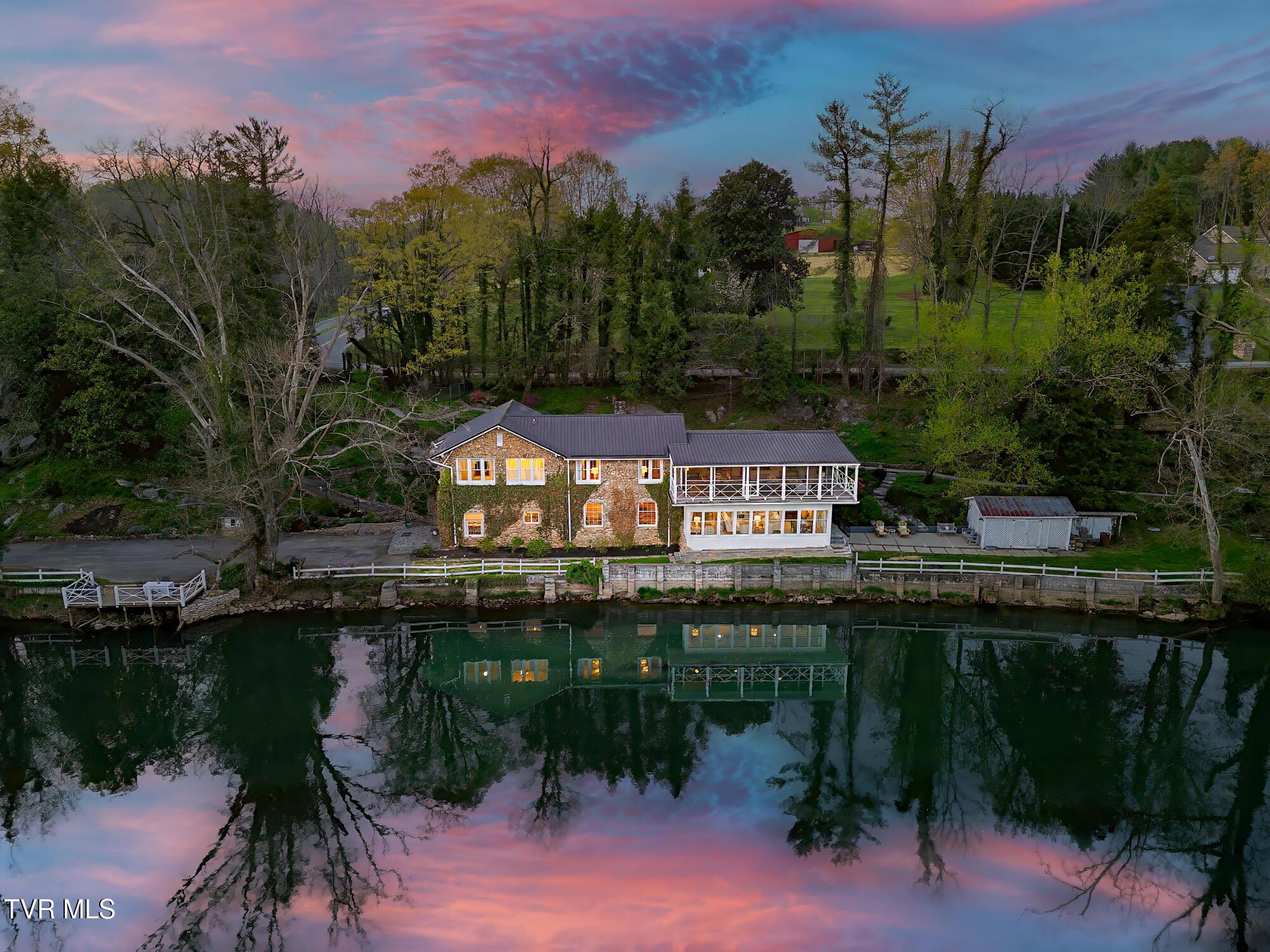 Photo of 4 bed, 4 bath, 3,495 sq ft single family residence at 1910 Riverside Road