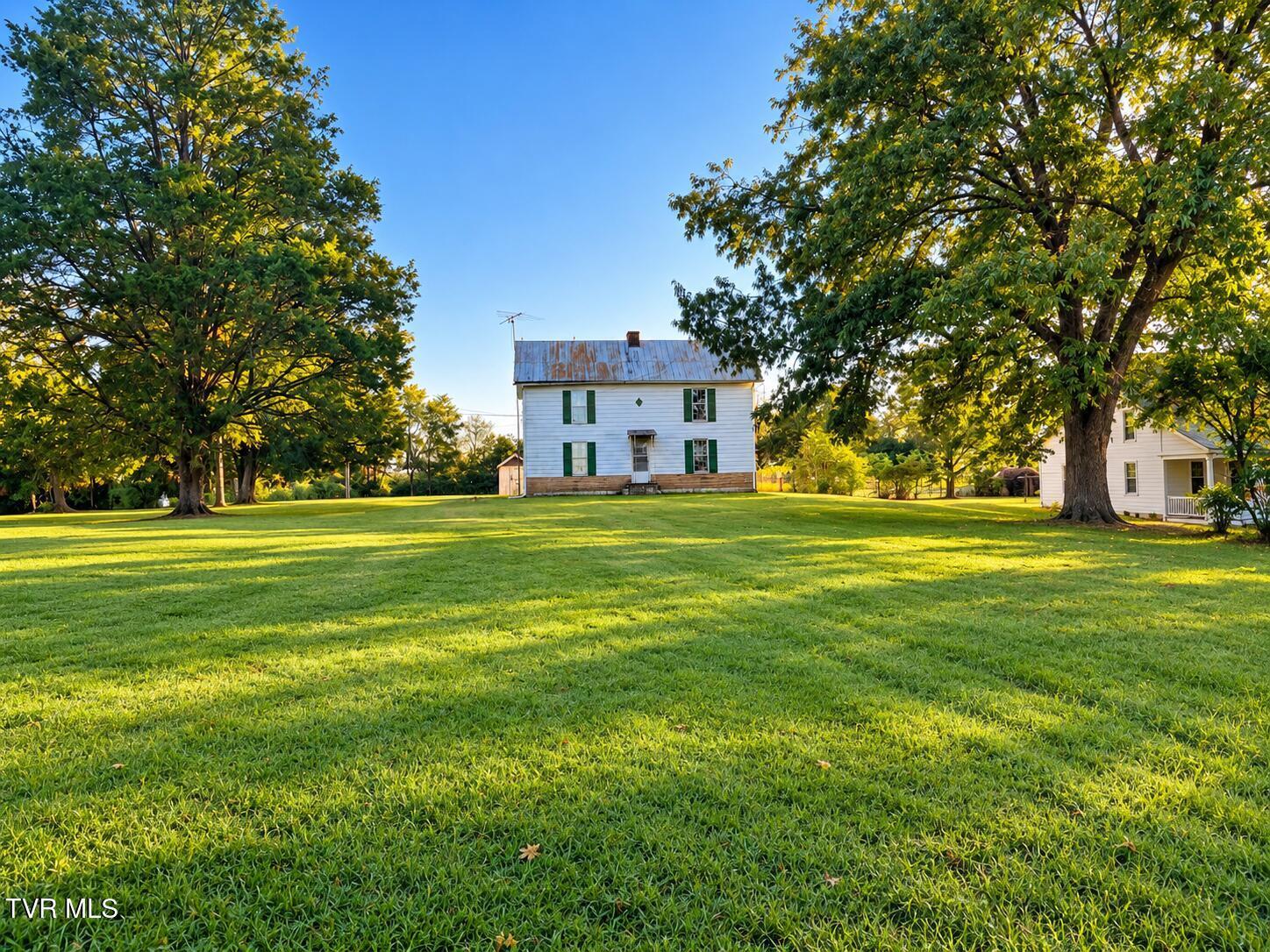 Golden-Hour Farmhouse Lawn