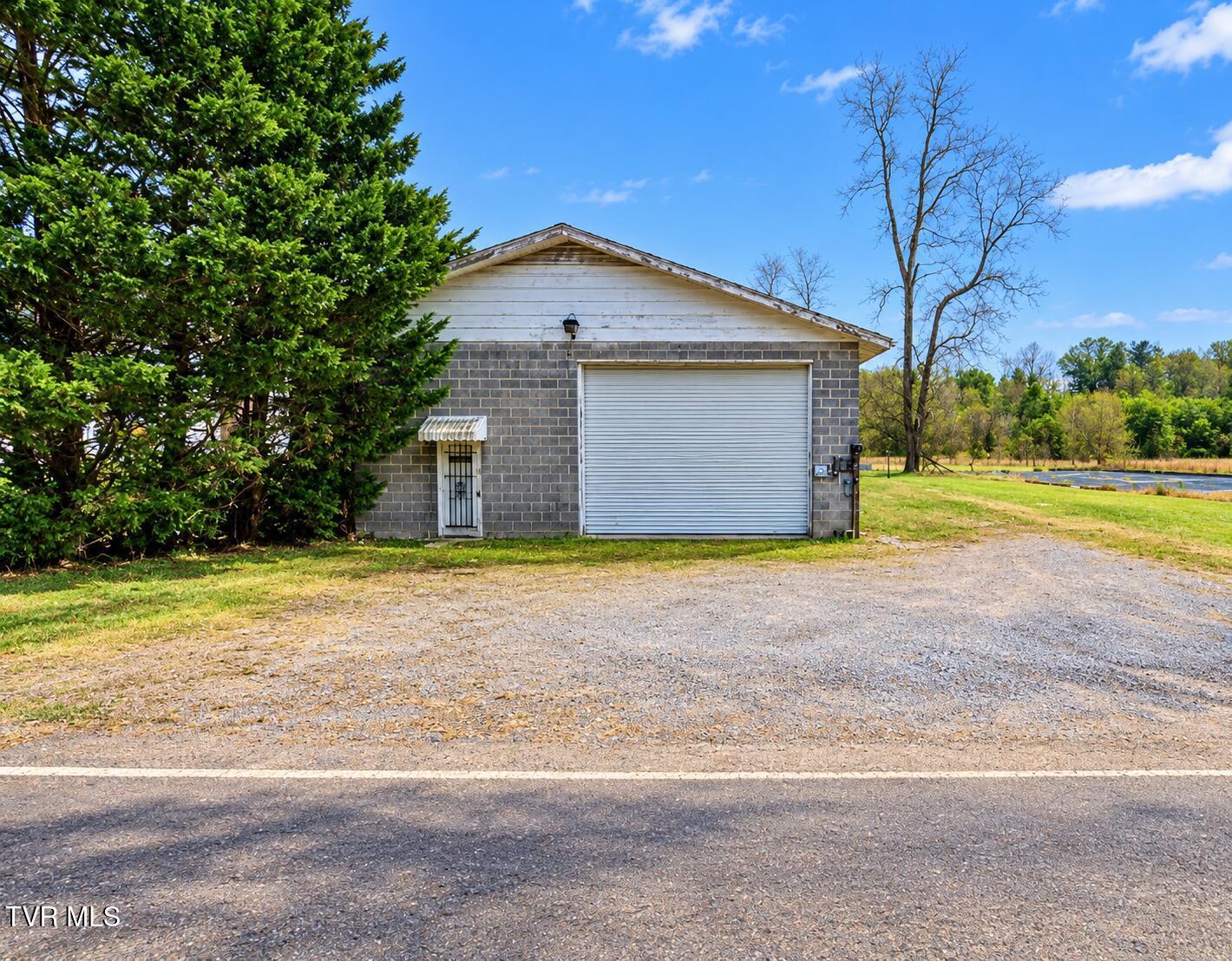 Rural Garage Warehouse by the Road